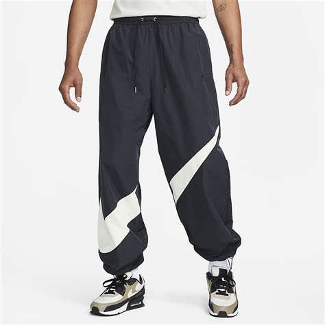 nike freizeithose sportswear swoosh pk pant schwarz weiß|Nike Solo Swoosh Track Pants .